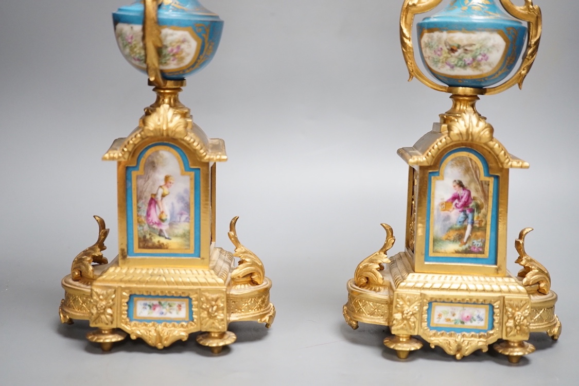 A pair of Louis XVI style ormolu and Sevres style porcelain candelabra 39cm